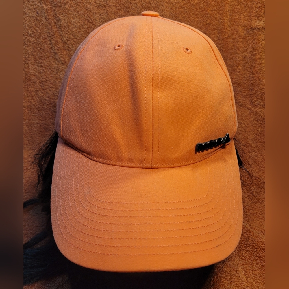 Ladies orange Reebok cap / hat.